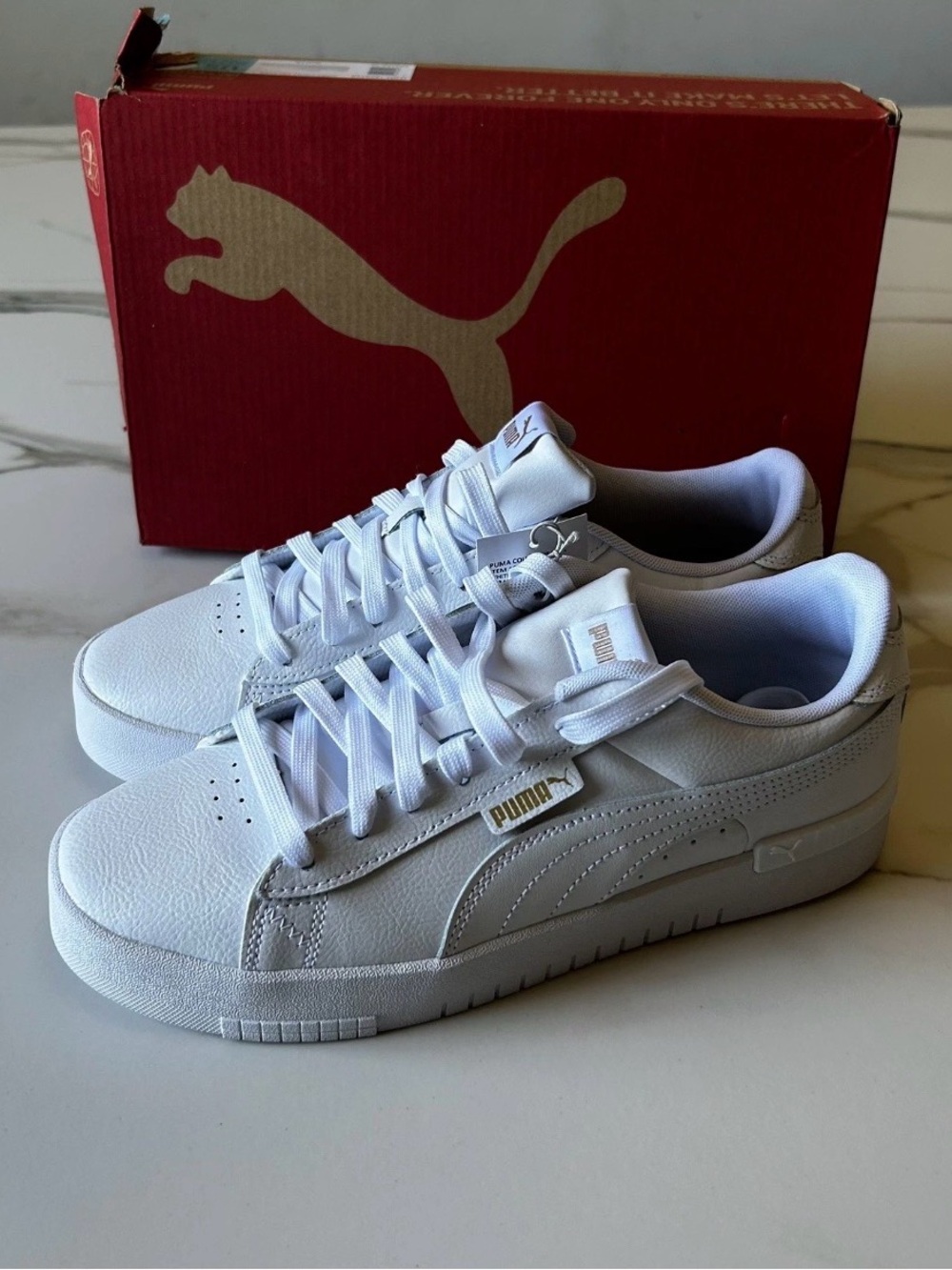 Puma White Low-Profile Lace-Up Sneakers with Subtle Gold Accent